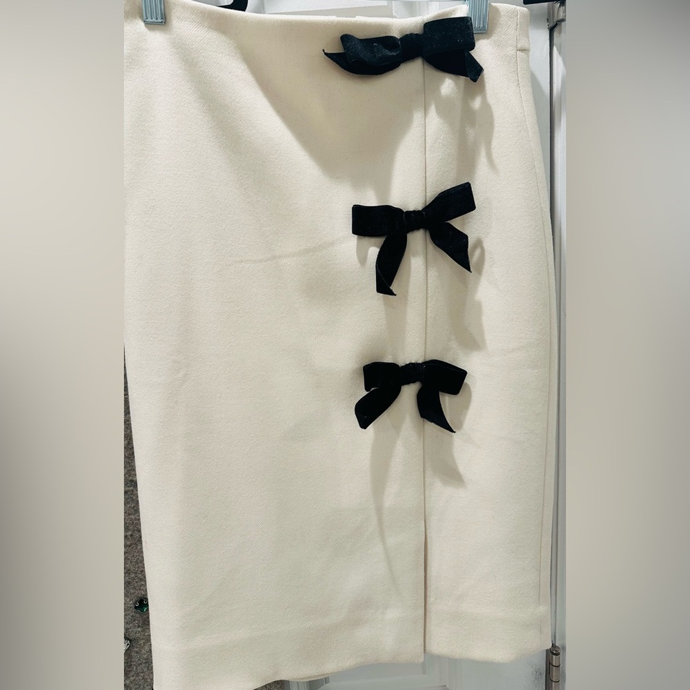 JCrew off white wool pencil skirt with black velvet bows, size 2